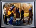 Image inside TV frame of HEU leaders being arrested