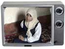 Iraqi girl inside TV frame