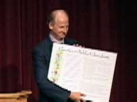 Saul with framed copy of the Charter for Public Education