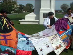 Canadian women with Quilt at the Peace Arch