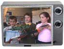 Students with war toys in tv frame