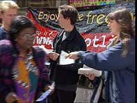 Dave & Helen leafletting again after the trial.