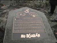 Plaque outdoors on Legislature grounds honouring Mac Paps