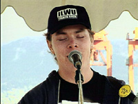 Ryan Cole singing at mike