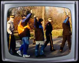 Image inside TV frame of HEU leaders being arrested