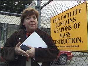 Libby Davies at gate to Bangor base