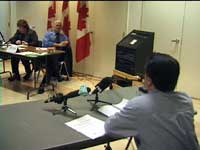 Libby Davies, Jack Layton listen to Bill Saunders