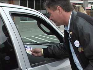 Leafletting Wal Mart shoppers 